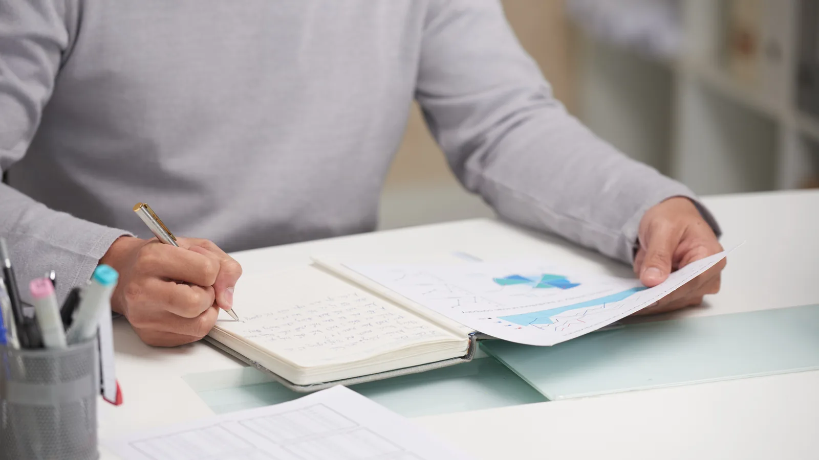 Practice administrator reviewing claim denials and remittance advice