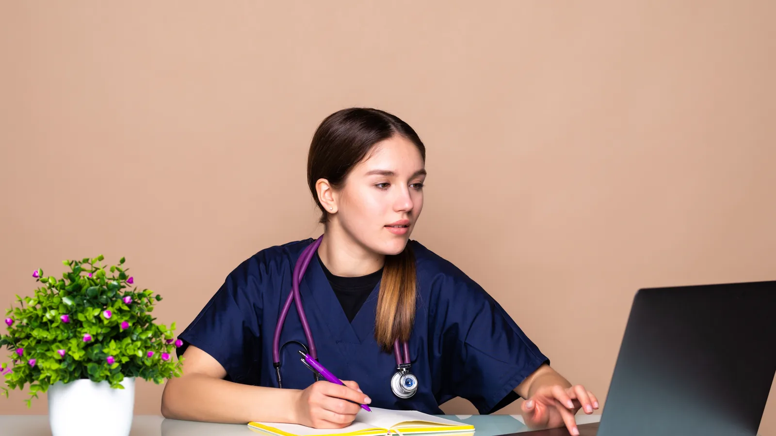 Clinician conducting a secure video session from a private office